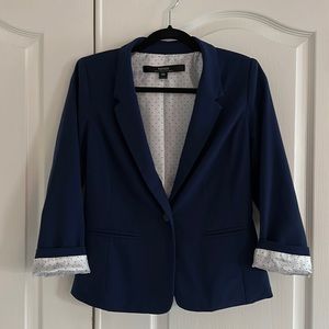 Navy blazer, cute sleeve accent.